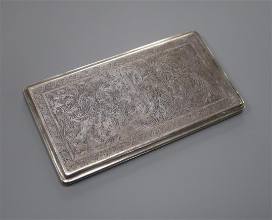 A Persian engraved white metal cigarette case, 236 grams.